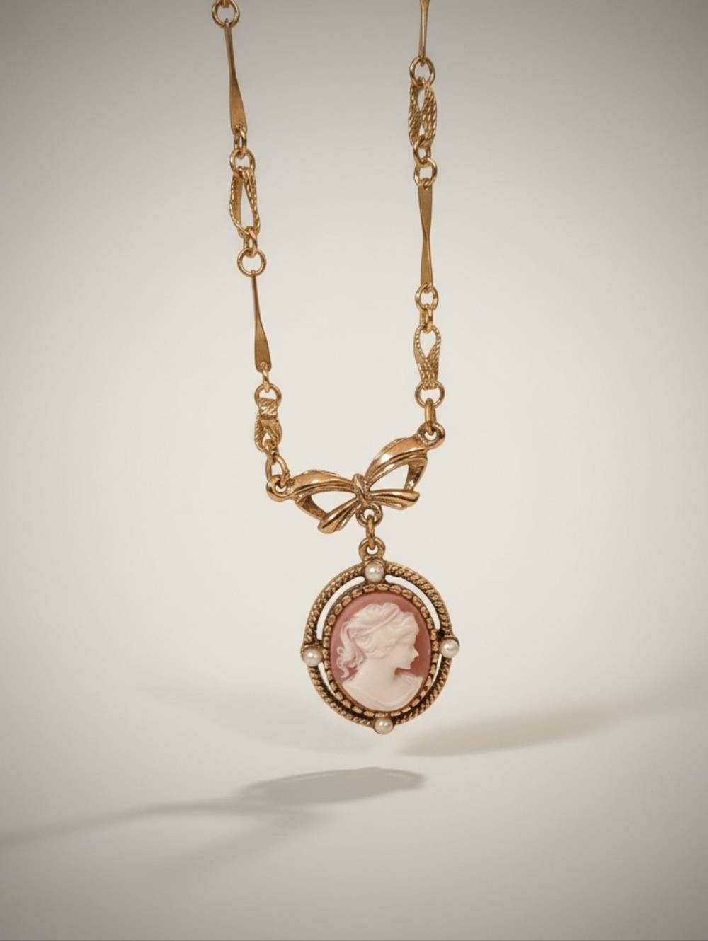 Vintage Inspired Pink Cameo Necklace Gold Tone Bow Pendant Coquette Romantic